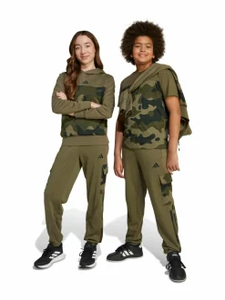 Housut|Housut & Jumpsuitit<adidas Sportswear Junior Camo 3 Stripes -reisitaskuhousut JN2218 OLISTR/BLACK