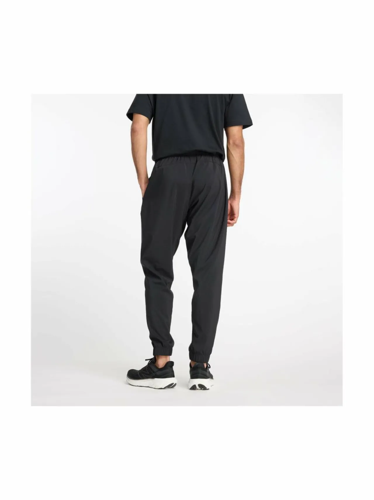 Urheiluhousut & Treenitrikoot<New Balance Sport Essentials Woven Jogger -housut BK BLACK