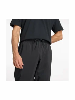 Urheiluhousut & Treenitrikoot<New Balance Sport Essentials Woven Jogger -housut BK BLACK