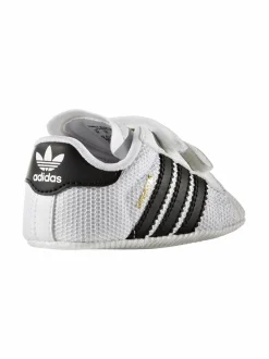 Ensiaskelkengät<adidas Originals Superstar Crib Baby -ensiaskelkengät FTWWHT/CBLACK/FTWWHT