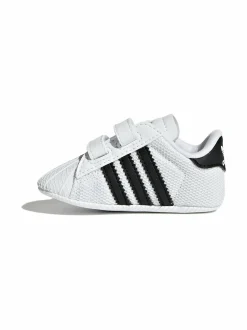 Ensiaskelkengät<adidas Originals Superstar Crib Baby -ensiaskelkengät FTWWHT/CBLACK/FTWWHT