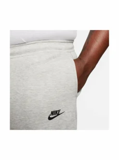 Urheiluhousut & Treenitrikoot<Nike Tech Fleece -collegehousut 063 DK GREY HEATHER/BLACK